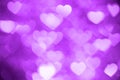 Purple heart bokeh background photo, abstract holiday backdrop Royalty Free Stock Photo