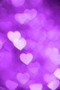 Purple heart bokeh background photo, abstract holiday backdrop Royalty Free Stock Photo