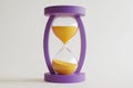 Purple Hourglass Sand Timer with Yellow Sand Isolated on Transparent Background Royalty Free Stock Photo