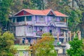 Purple house at the mountains at Gayabari village. India