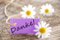 Purple label with Danke! Royalty Free Stock Photo