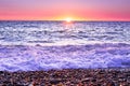 Purple landscape with sea and sunset Royalty Free Stock Photo