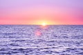 Purple landscape with sea and sunset Royalty Free Stock Photo