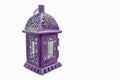 Purple lantern. Candlestick in the form of retro lamp. Purple ca Royalty Free Stock Photo