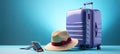 Purple large suitcase on wheels hat and smartphone on a blue background. The concept of future travel. Generated by And