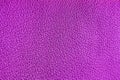 Purple leather background, close-up, a leather texture, a seamless fabric Royalty Free Stock Photo