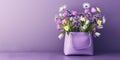 Purple leather bag full of colorful spring flowers on purple background with copy space Royalty Free Stock Photo