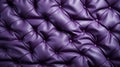 A purple leather upholstery with buttons