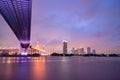 Purple led light under the bridge over the river On a cloudy day in the sky. Bhumibol Bridge, Samut Prakan, Thailand Royalty Free Stock Photo