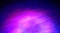 Purple light over a wooden surface creating a artistic colored texture