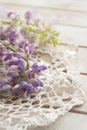 Purple lupin flowers with vintage lace on white background. Lupinus, lupine. Tender card Royalty Free Stock Photo
