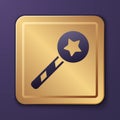 Purple Magic wand icon isolated on purple background. Star shape magic accessory. Magical power. Gold square button Royalty Free Stock Photo