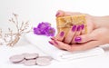 Purple manicure and herbal soap Royalty Free Stock Photo
