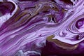 Purple marble abstract background. Mixed inks with gold glitter.