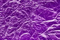 Purple metallic foil shiny texture, wrinkled wrapping paper for background and design art work Royalty Free Stock Photo