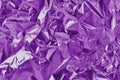 Purple metallic foil shiny texture, wrinkled wrapping paper for background and design art work Royalty Free Stock Photo