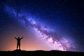 Purple Milky Way with silhouette of a standing man Royalty Free Stock Photo