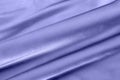 Purple natural silk fabric texture with soft folds Royalty Free Stock Photo