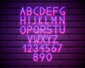 Purple Neon Alphabet Font. Light effect letters, numbers on the brick wall background. Vector typeface for labels, titles, posters Royalty Free Stock Photo