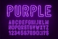 Purple neon light font on a dark background. Royalty Free Stock Photo