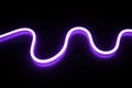 Purple Neon Light Tube with Wavy Pattern on Black Background. Royalty Free Stock Photo