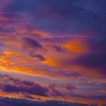 Purple orange sunset. Evening sky with clouds. Beautiful colorful sky background Royalty Free Stock Photo