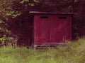 Photo of Purple outdoor restroom Royalty Free Stock Photo