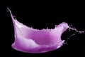 Purple paint splash isolated on black background Royalty Free Stock Photo