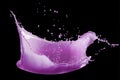 Purple paint splash isolated on black background Royalty Free Stock Photo