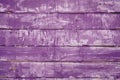 purple paint texture peeling off of wooden planks