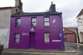 Purple painted holiday cottage on Isle of Man