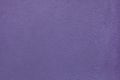 Purple painted stucco wall. Background texture