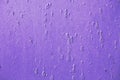 Purple painting on rusty metal surface Royalty Free Stock Photo