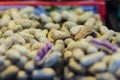 Purple peanut for sale at the fresh market. The peanut, also known as the groundnut and the goober.