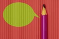 Purple pencil on with green speech bubble