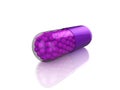 Purple pill Royalty Free Stock Photo