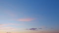 Purple pink blue sunset sky clouds. Clouds with pink, purple and dark colors at sunset sky. Timelapse. Royalty Free Stock Photo