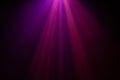 Purple and pink color wide lens projector with light beam for movie and cinema at night . smoke texture spotlight . screening for Royalty Free Stock Photo