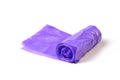 Purple plastic polyethylene trash bag roll isolated over the white background Royalty Free Stock Photo