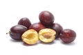 Purple plums isolated on white background. Royalty Free Stock Photo