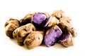 Purple potatos on white Royalty Free Stock Photo