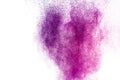 Purple powder explosion. Abstract closeup dust on backdrop. Colorful explode. Paint holi