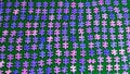 Purple puzzle pieces sorted on a green table cloth Royalty Free Stock Photo