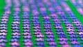 Purple puzzle pieces sorted on a green table cloth Royalty Free Stock Photo