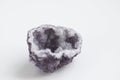 Purple quartz druse or geode mineral stone. Close up photo mineralogy and esotericism.