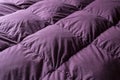 Purple quilted texture with diagonal lines. contrast. selective focus. elegant design for graphic resources