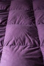 Purple quilted texture with vertical lines. contrast. selective focus. elegant design for graphic resources