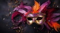 purple, red and gold masquerade mask with red feathers and sparkles against a black background, Royalty Free Stock Photo