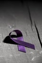 Purple ribbon against the violence against women Royalty Free Stock Photo