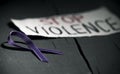 Purple ribbon against the violence against women